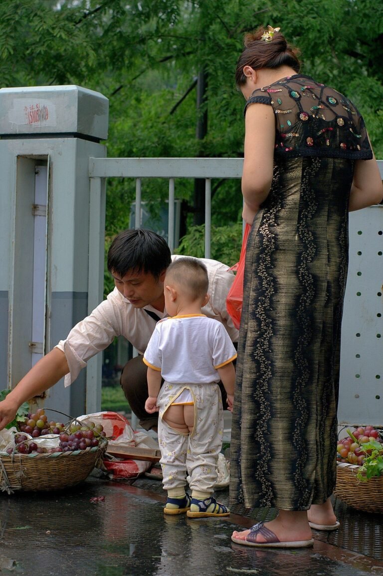 A woman and his kid are buying fruits.jpg