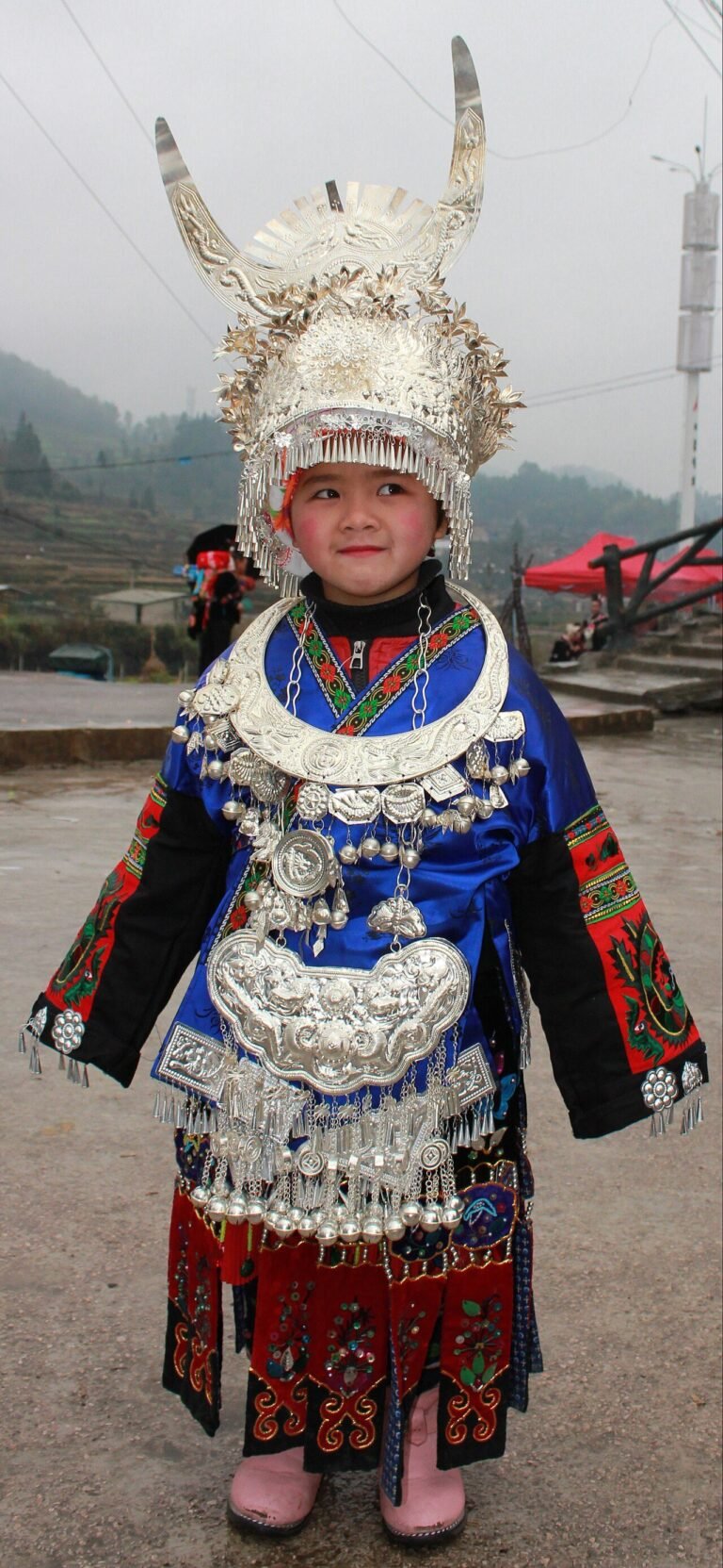 Danjiang, Miao village, little girl at festival.jpg